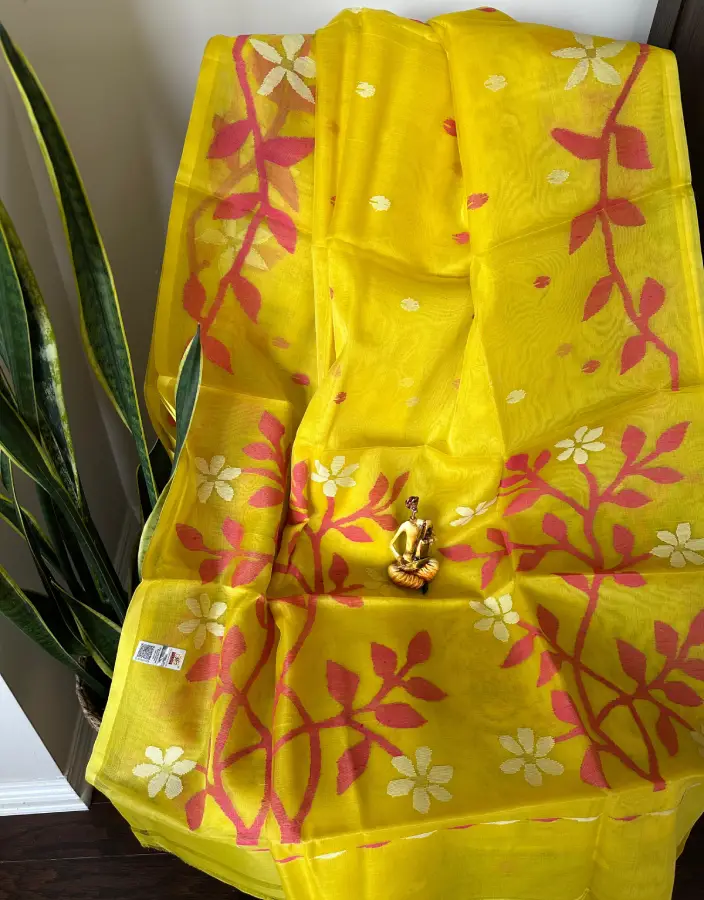 Sunshine Yellow Organza Saree with Pink and White Floral Handwoven Design Sunshine Yellow Organza Saree with Pink and White Floral Handwoven Design