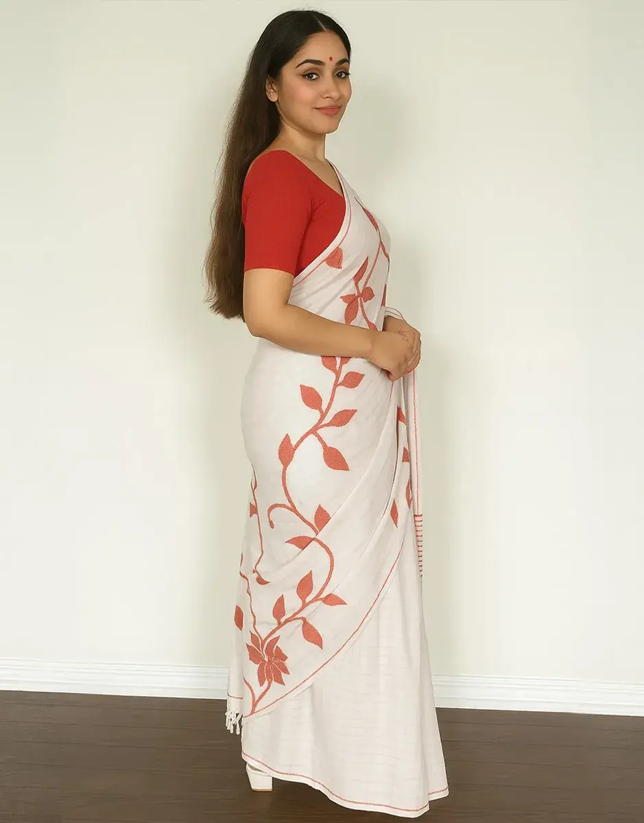 White Kanthastitch Saree with Pink Floral Vines and Bold Paisley Motif White Kanthastitch Saree with Pink Floral Vines and Bold Paisley Motif