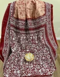 Rust body and Maroon Border Bangalore silk Saree with White Kanthastitch and Batik body