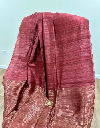 Maroon solid body Matka Silk Saree with golden striped pallu