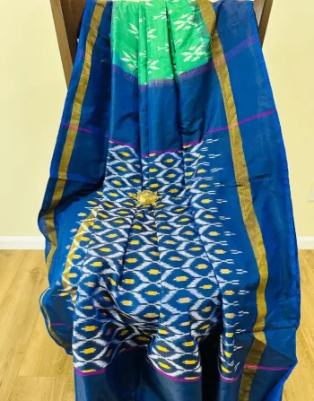 Green and blue Ikkat silk saree with traditional weave